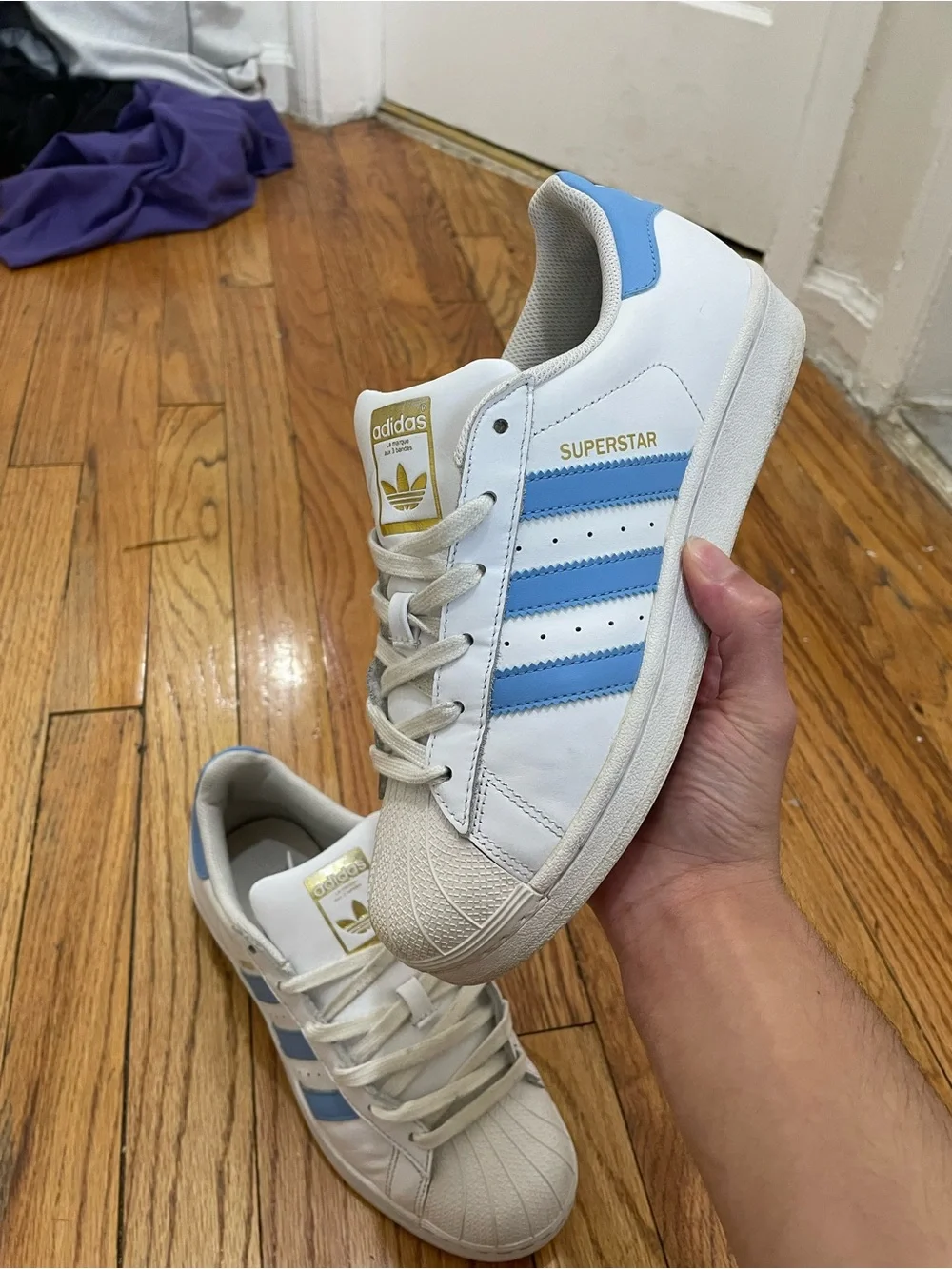 adidas Superstar Men’s Sneakers in White with Light Blue Stripes